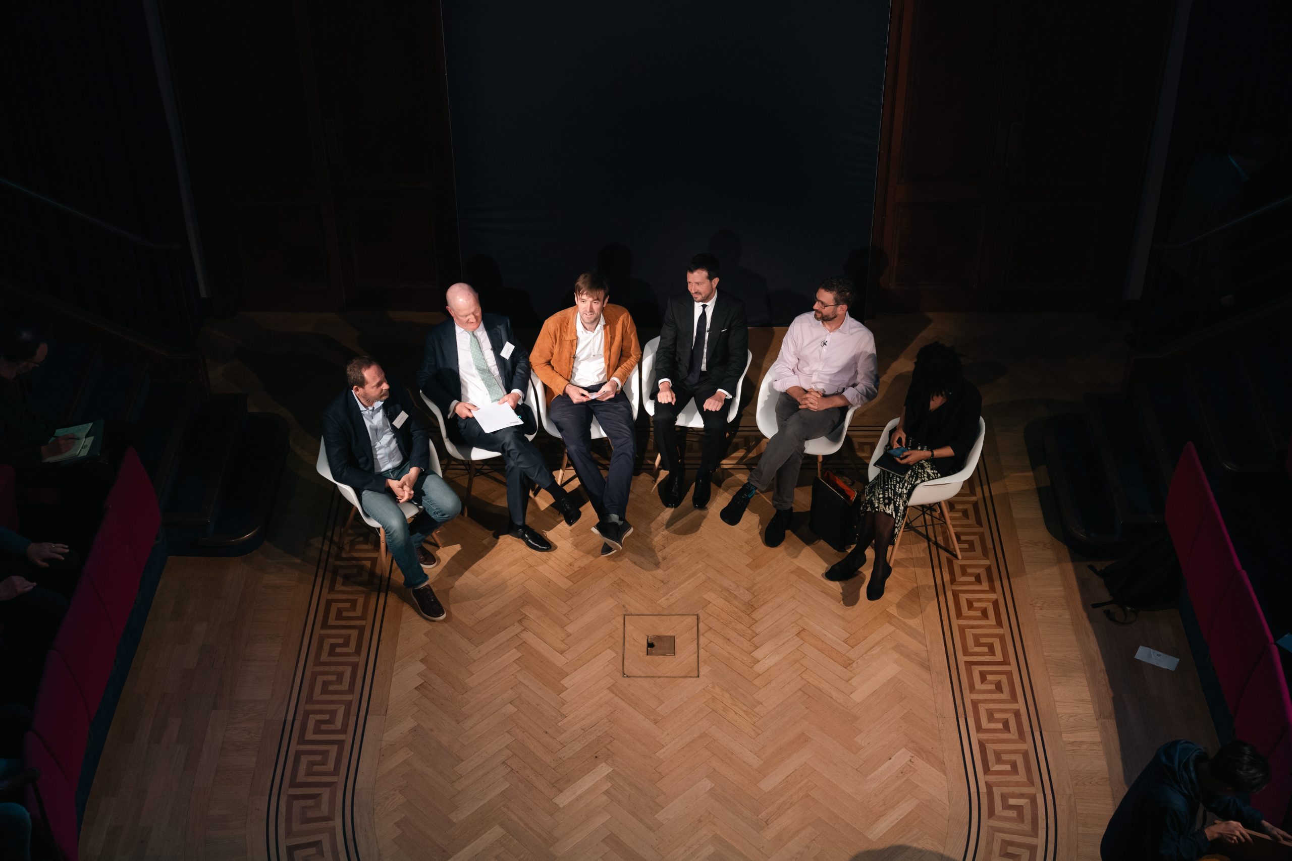 Organising genius: scientific progress and global cooperation